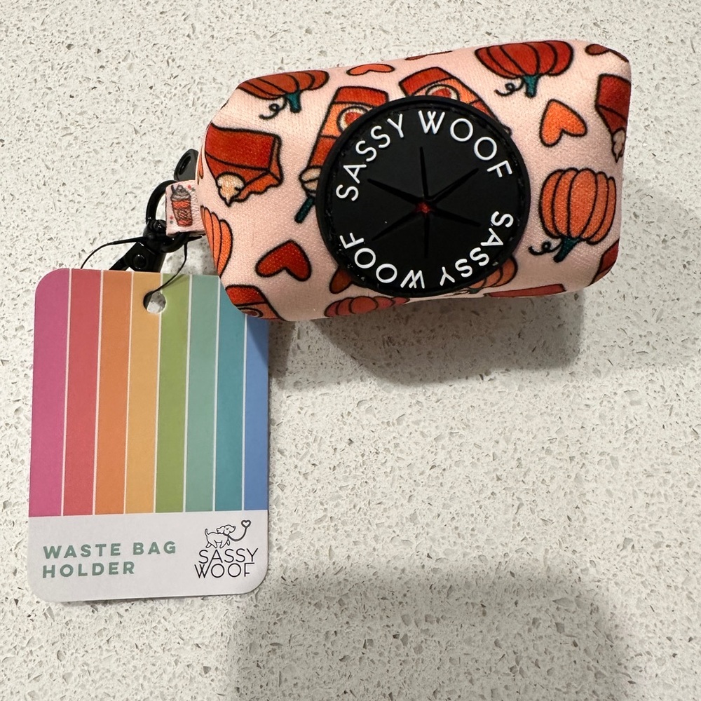 Dog waste bag holder / dispenser from Sassy Woof